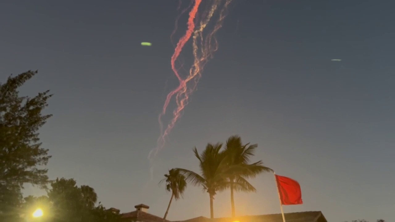 Footage appears to capture debris in the sky in the wake of SpaceX's Starship rocket experiencing a 'rapid unscheduled disassembly' during its Jan. 16 flight test. [Credit: Greg Munch /TMX] 